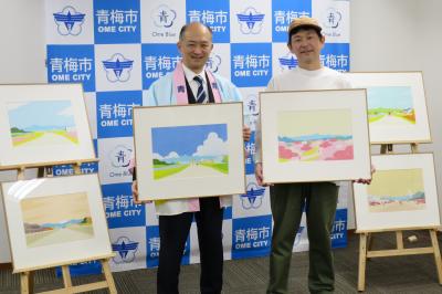 11月15日移住・定住プロモーションキービジュアルイラスト贈呈式の写真