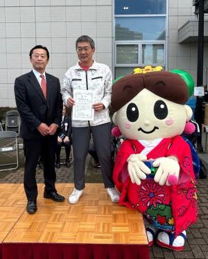 西東京農業協同組合賞受賞者富田氏の表彰時の写真